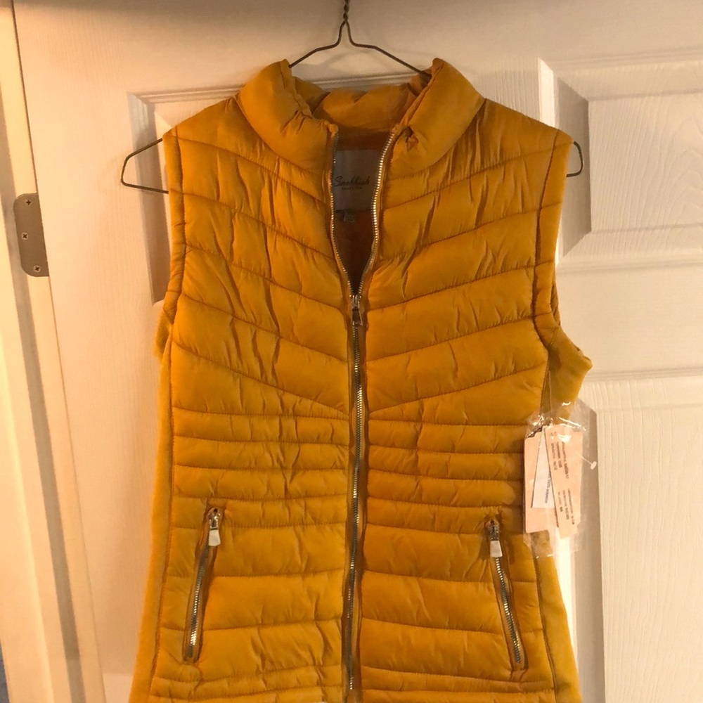 Mustard yellow vest. Very soft inside.